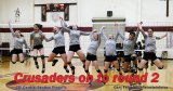 The Kings Christian High School Crusaders' volleyball team celebrate after its 3-0 Central Section playoff win Thursday night in Lemoore.